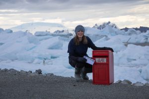 Kirsten Shaw with post box and letter (BAS-MATT HUGHES)